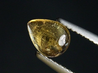 Dravite Tourmaline 0,65 Ct. pear cabochon Brazil