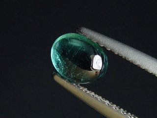 Indigolite / blue Tourmaline 0,75 Ct. oval cabochon Brazil