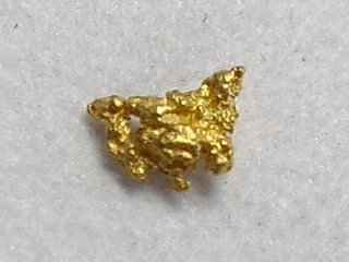 Gold nugget 4 mm - Palsinoja, Lappia, Finland