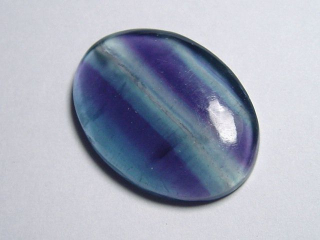 Fluorite 31,22 Ct. multicolor banded cabochon