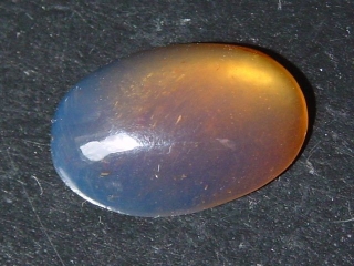 Blauer Bernstein 4,17 Ct. - 20,5 mm Oval Cabochon Indonesien