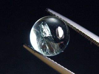 Aquamarine 3,71 Ct. round cabochon
