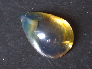 Blue Amber 5,71 Ct. - 21 mm pear cabochon Domin. Republic