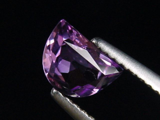 Amethyst 0,73 Ct. half moon cut Brazil