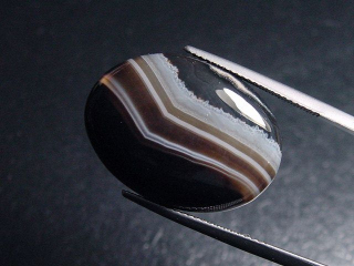 Achat 23,22 Ct. gebändert - Oval Cabochon Brasilien