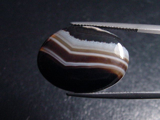 Achat 23,22 Ct. gebändert - Oval Cabochon Brasilien