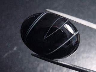 Achat 23,90 Ct. gebändert - Oval Cabochon Brasilien