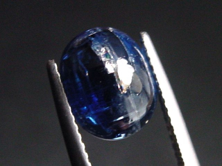 Kyanite / Disthen 4,42 Ct. oval cabochon Brazil b-quality