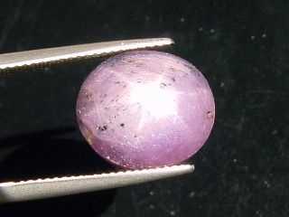 Star Ruby 16,30 Ct. - good star effect - oval cabochon