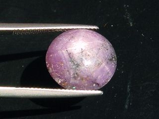 Star Ruby 18,05 Ct. - good star effect - oval cabochon