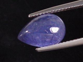 Tanzanite 3,90 Ct. - violet - 12 x 8 mm pear cabochon