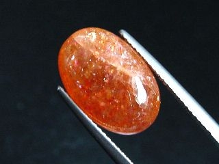 Sunstone 6,89 Ct. oval cabochon 16 x 11 mm Sri Lanka