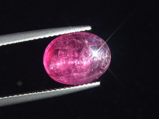 Rubellite Tourmaline cat's eye 3,56 Ct. oval cabochon Brazil