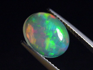Opal 2,38 Ct. finest quality - oval cabochon