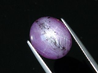 Star Ruby 17,81 Ct. - good star effect - oval cabochon