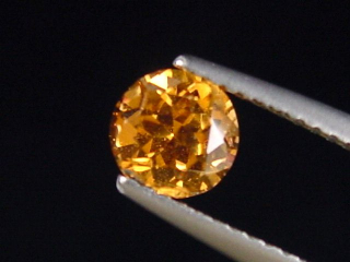 Spessartit Granat 0,98 Ct. leuchtend orange 6 mm Rund Tansania B-Qualität