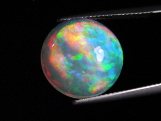 Opal / Edelopal 7,64 Ct. feinste Qualität - 15 mm Rund Cabochon