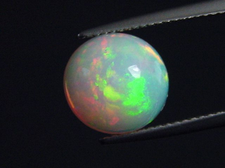 Opal 3,42 Ct. finest quality - round cabochon