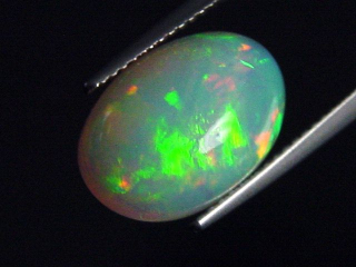 Opal 4,62 Ct. finest quality - oval cabochon