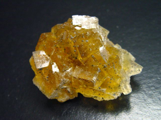 Fluorit Stufe 42 mm orange Kristalle - Asturien, Spanien