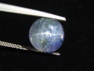 Zoisite / Tanzanite cat's eye 3,42 Ct. bicolor unheated rare Tanzania