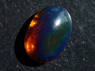 Blauer Bernstein 14,05 Ct. - 25 mm Oval Cabochon Indonesien