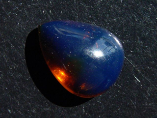 Blauer Bernstein 13,60 Ct. - 24,5 mm Tropfen Cabochon Indonesien
