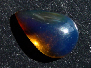 Blue Amber 4,72 Ct. - 19,5 mm cabochon