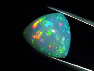 Opal 6,67 Ct. finest quality - trillion cabochon