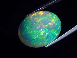 Opal 11,12 Ct. finest quality - oval cabochon