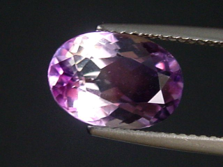 Preview: Amethyst with clear Quartz 2,96 Ct. bicolor oval