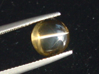 Smokey Quartz cat's eye 2,74 Ct. - round cabochon Brazil