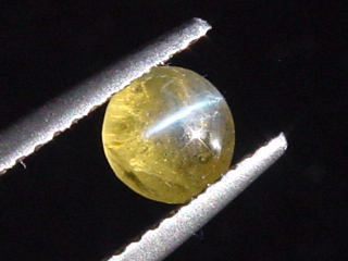 Chrysoberyll Katzenauge 0,82 Ct. Rund Cabochon Sri Lanka