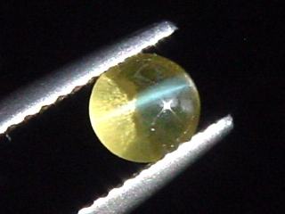 Chrysoberyll Katzenauge 0,76 Ct. Rund Cabochon Sri Lanka