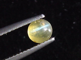 Chrysoberyll Katzenauge 0,76 Ct. Rund Cabochon Sri Lanka