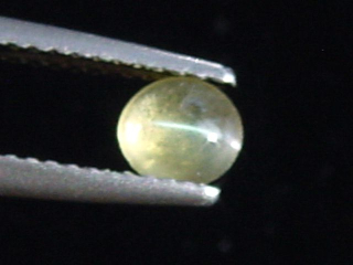 Chrysoberyll Katzenauge 0,55 Ct. Rund Cabochon Sri Lanka