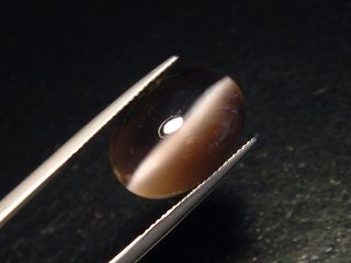 Sillimanite cat's eye 18,06 Ct. oval cabochon Sri Lanka