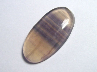 Colorchange Fluorite 28,74 Ct. green to purple cabochon