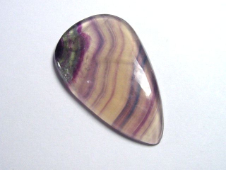Fluorit 42,92 Ct. bunt gebändert Tropfen Cabochon