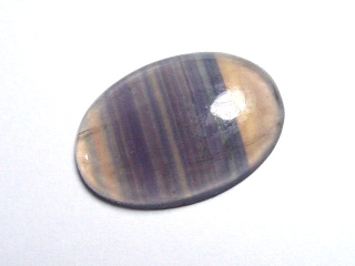 Farbwechsel Fluorit 23,44 Ct. grün zu violett Oval Cabochon