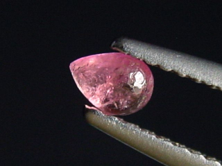 Pezzottaite 0,18 Ct. cabochon - rare Madagascar