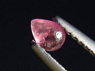 Pezzottaite 0,18 Ct. cabochon - rare Madagascar