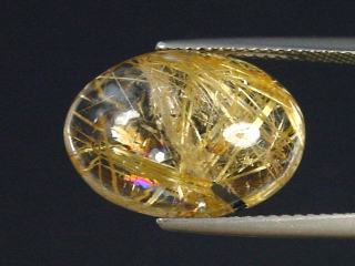 Preview: Rutilquarz 9,13 Ct. fein 17 x 12 mm Oval Cabochon
