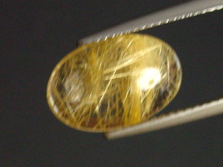 Preview: Rutilquarz 4,09 Ct. fein 14 x 9 mm Oval Cabochon