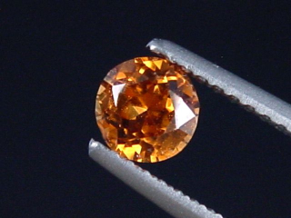 Spessartite Garnet 0,56 Ct. fine orange round Tanzania