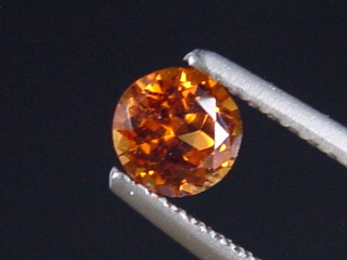Preview: Spessartit Granat 0,50 Ct. leuchtend orange 4,5 mm Rund Tansania