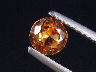 Spessartit Granat 0,53 Ct. leuchtend orange 5 mm Rund Tansania