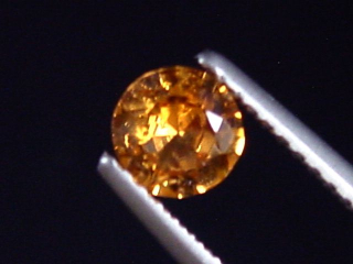 Preview: Spessartit Granat 0,53 Ct. leuchtend orange 5 mm Rund Tansania