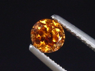Spessartit Granat 0,44 Ct. leuchtend orange 4,5 mm Rund Tansania
