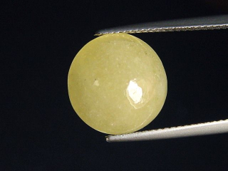 Preview: Danburit 9,38 Ct. gelb Rund Cabochon Tansania